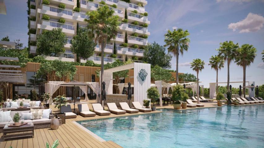 Luxury hotel with 212 residences, 144 rooms, and prime location near beach & city center