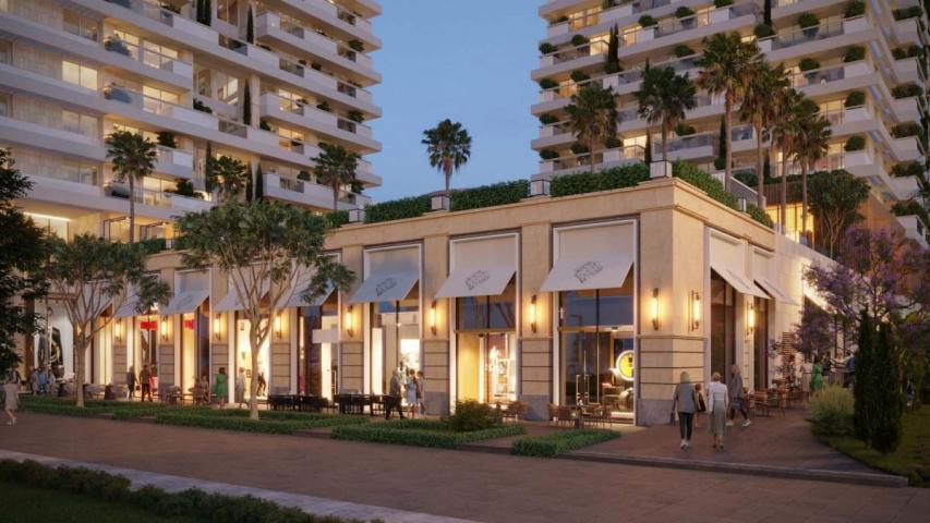 Luxury hotel with 212 residences, 144 rooms, and prime location near beach & city center