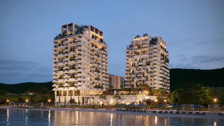 Luxury hotel with 212 residences, 144 rooms, and prime location near beach & city center