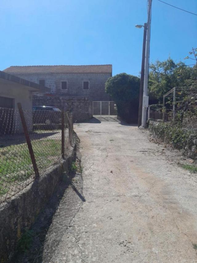 Big land with two stone houses