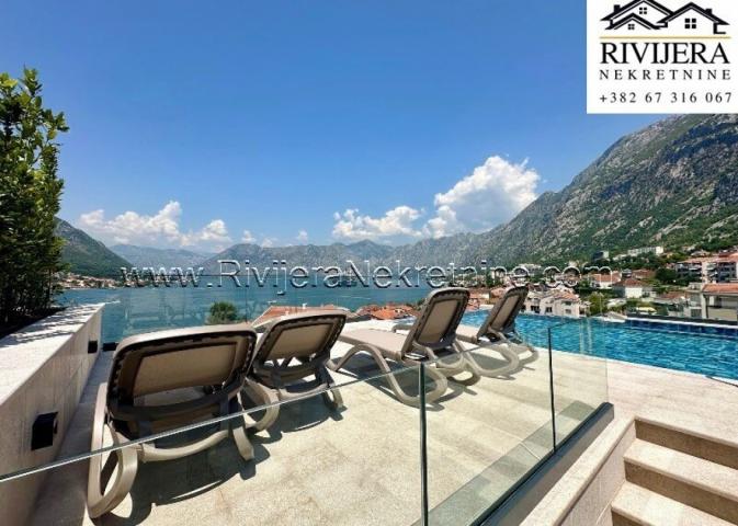 For sale luxury three-bedroom apartment with a pool in Dobrota Kotor