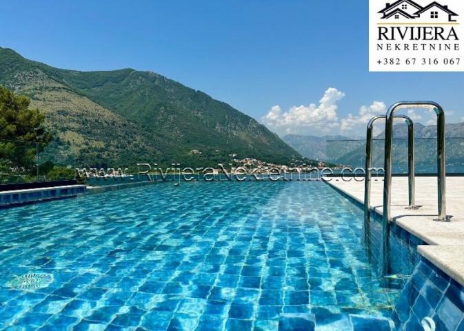 For sale luxury three-bedroom apartment with a pool in Dobrota Kotor