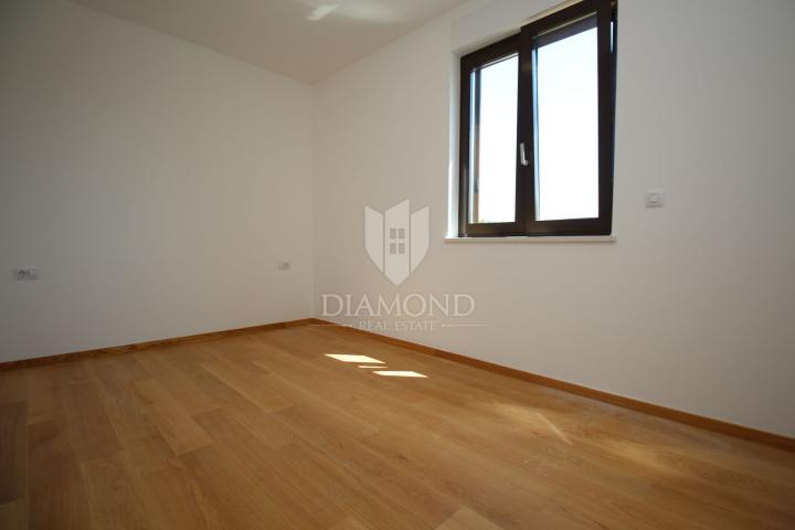 Labin, luxury apartment in a new building with a sea view