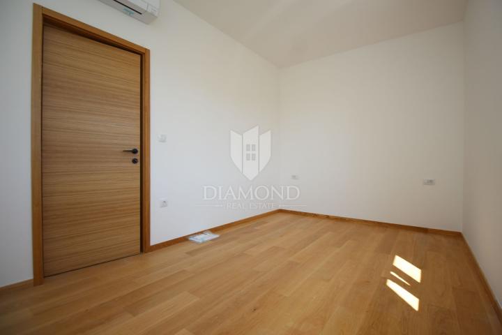 Labin, luxury apartment in a new building with a sea view