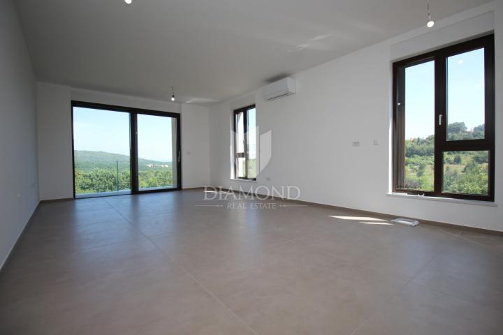 Labin, luxury apartment in a new building with a sea view