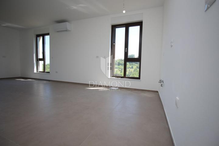 Labin, luxury apartment in a new building with a sea view