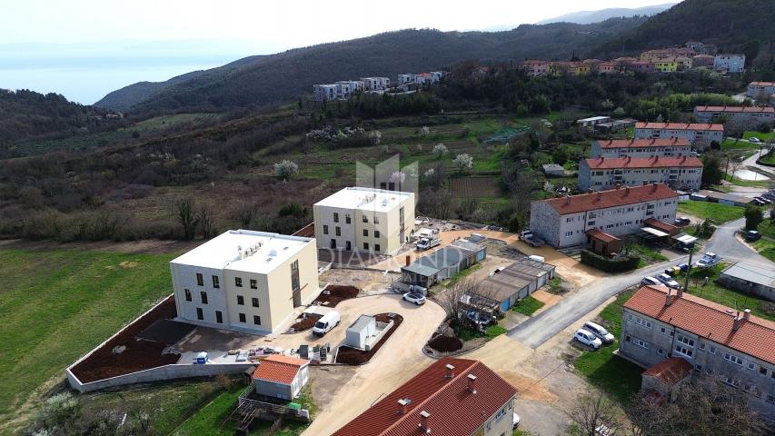 Labin, luxury apartment in a new building with a sea view