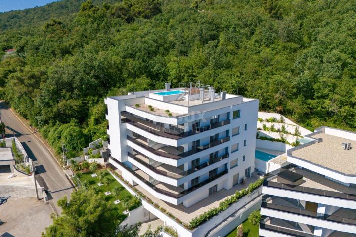 OPATIJA, CENTER - apartment in a superb new building with sea view, shared pool, garage