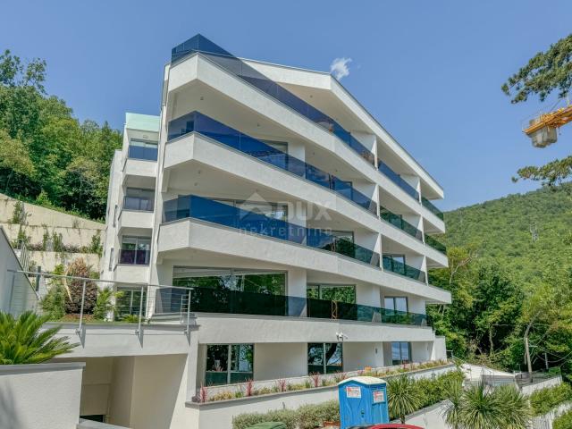 OPATIJA, CENTER - excellent apartment in a new building with a sea view, shared pool, garage