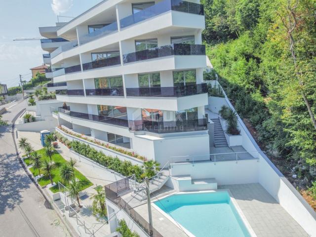 OPATIJA, CENTER - excellent apartment in a new building with a sea view, shared pool, garage