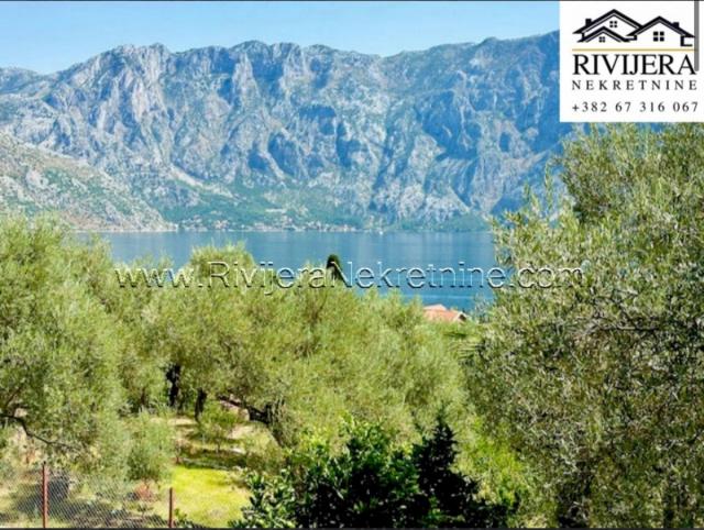 For sale two story house with a large yard in Prcanj Kotor