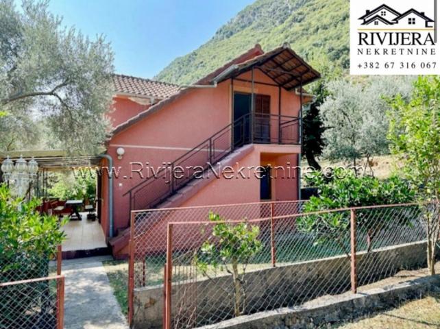 For sale two story house with a large yard in Prcanj Kotor