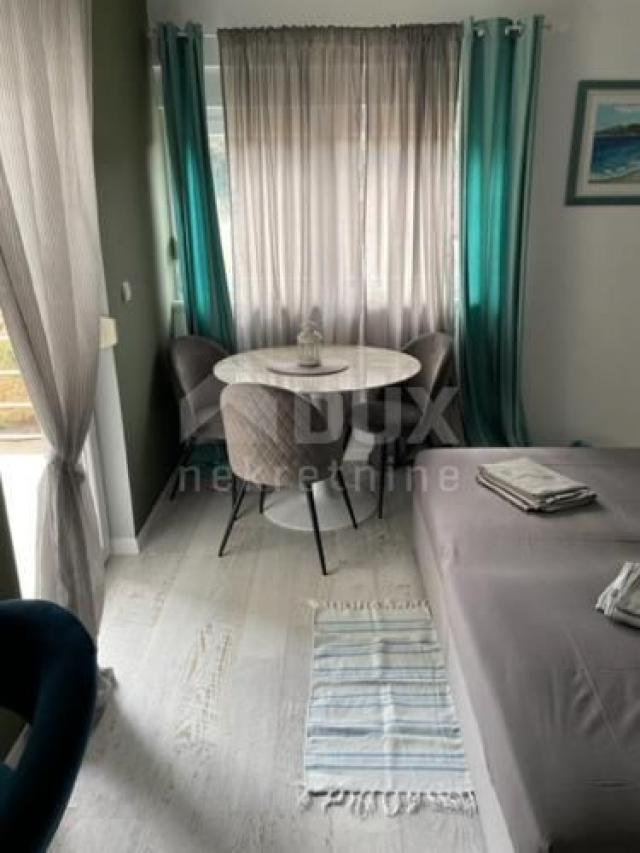 OTOK RAB, KAMPOR - Studio apartman s dvorištem 60 m2