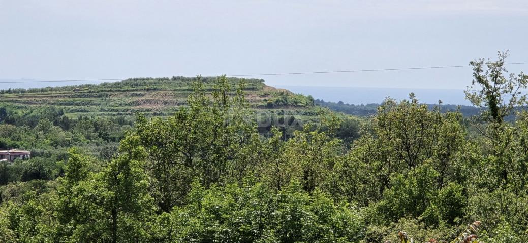 ISTRA, BUJE - Građevinsko zemljište s dozvolom za dvije vile s bazenom, prekrasan pogled na more