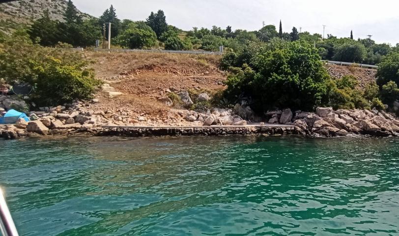 ZADAR, TRIBANJ - građevinsko zemljište prvi red do mora 4. 525 m2 za stambenu zgradu - stanove / apa