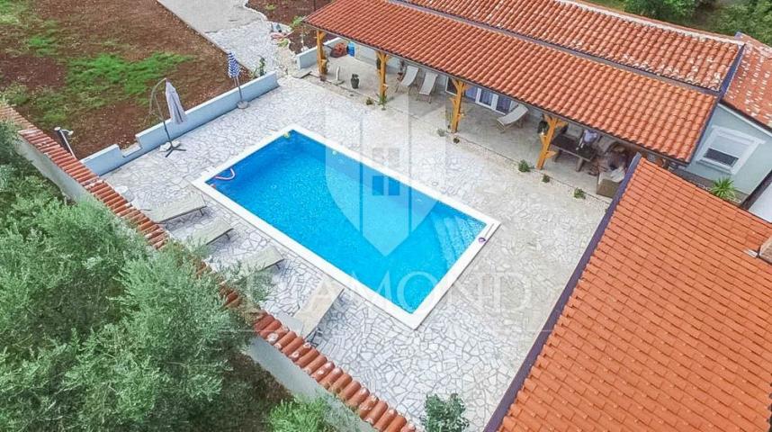 Surroundings of Medulin, house with pool surrounded by greenery