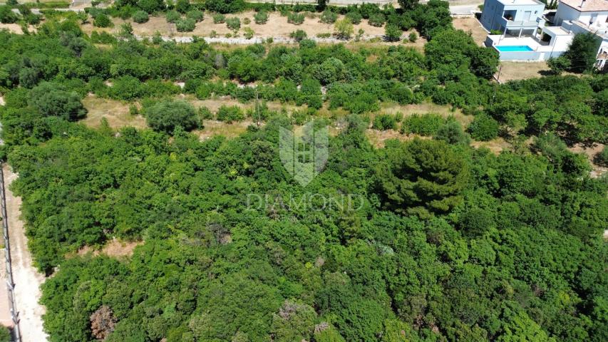 Labin, surroundings, building plot by the sea