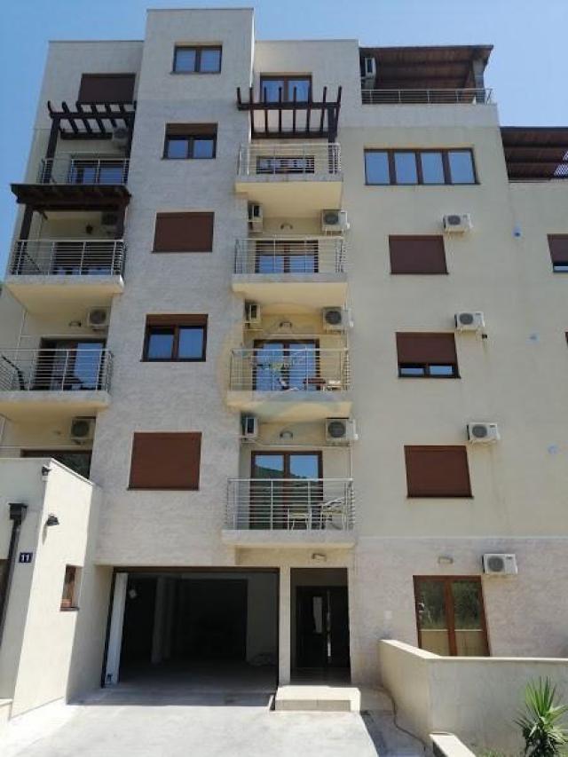 A four bedroom apartment for sale in Budva with a sea view