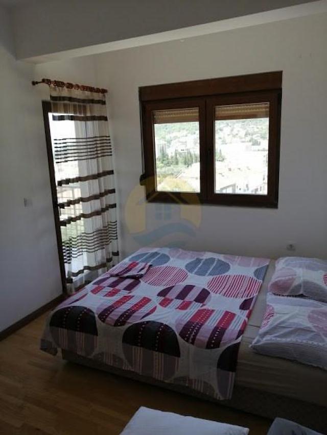 A four bedroom apartment for sale in Budva with a sea view