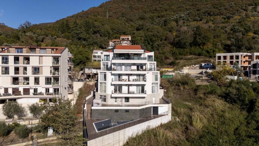 Modern two-bedroom apartment with spacious terraces and partial sea views