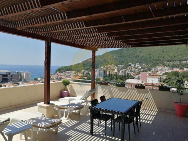 A four bedroom apartment for sale in Budva with a sea view