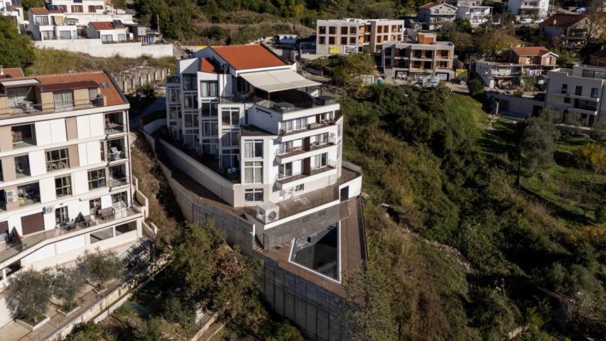 Modern two-bedroom apartment with spacious terraces and partial sea views