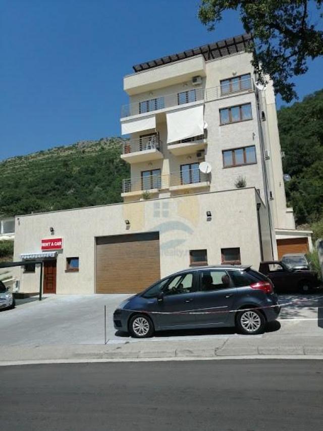 A four bedroom apartment for sale in Budva with a sea view