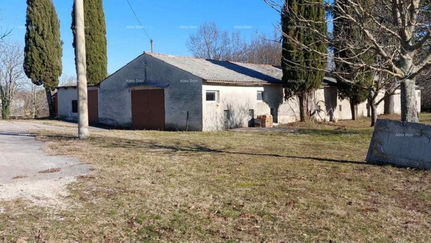 House A building plot for sale near Žminj with an outbuilding.