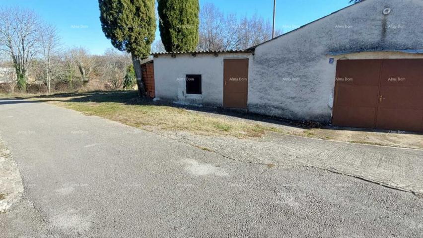 House A building plot for sale near Žminj with an outbuilding.