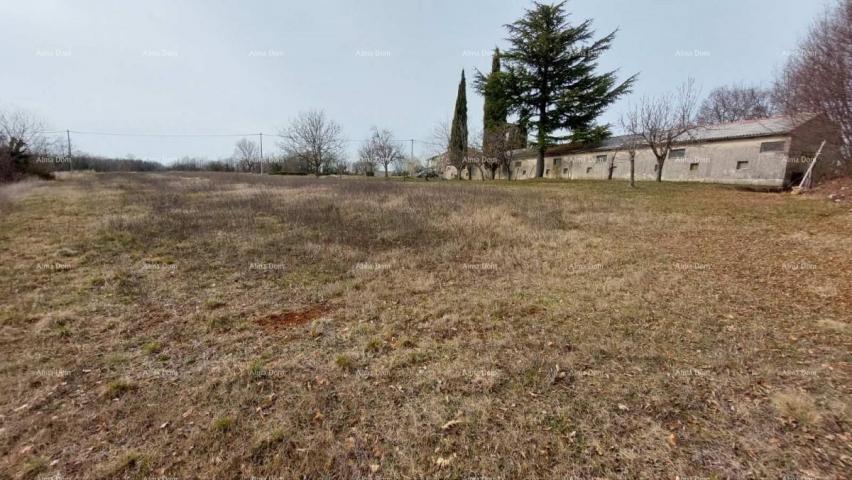 House A building plot for sale near Žminj with an outbuilding.