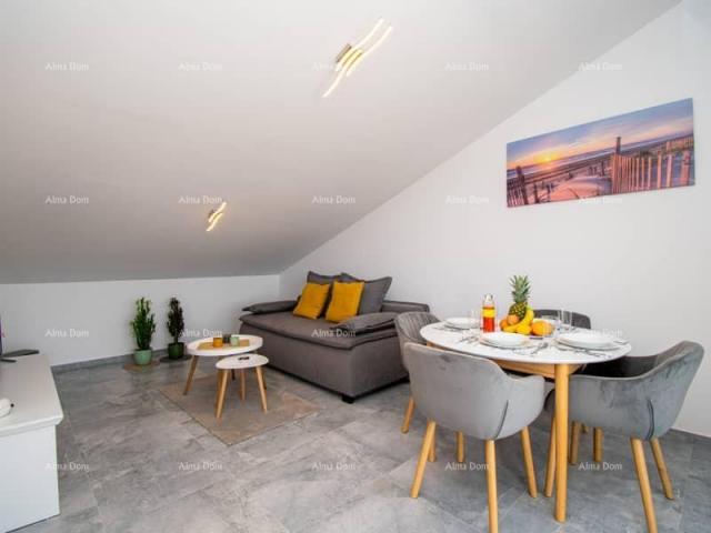 Wohnung Medulin. Mukalba. Modernes Apartment mit großer Terrasse und Meerblick.