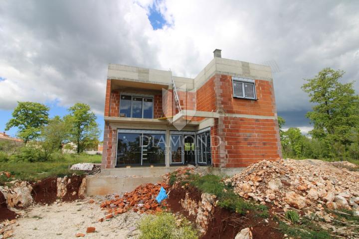 Marčana, surroundings, holiday house under construction, sea view