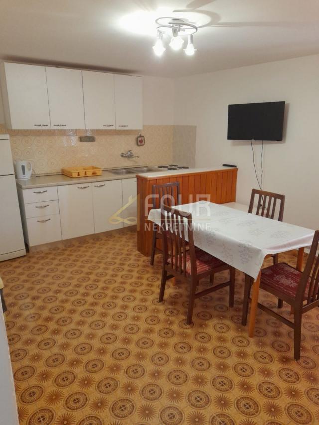 Otok Rab, Supetarska Draga, kuća s 5 apartmana, 1. red do mora