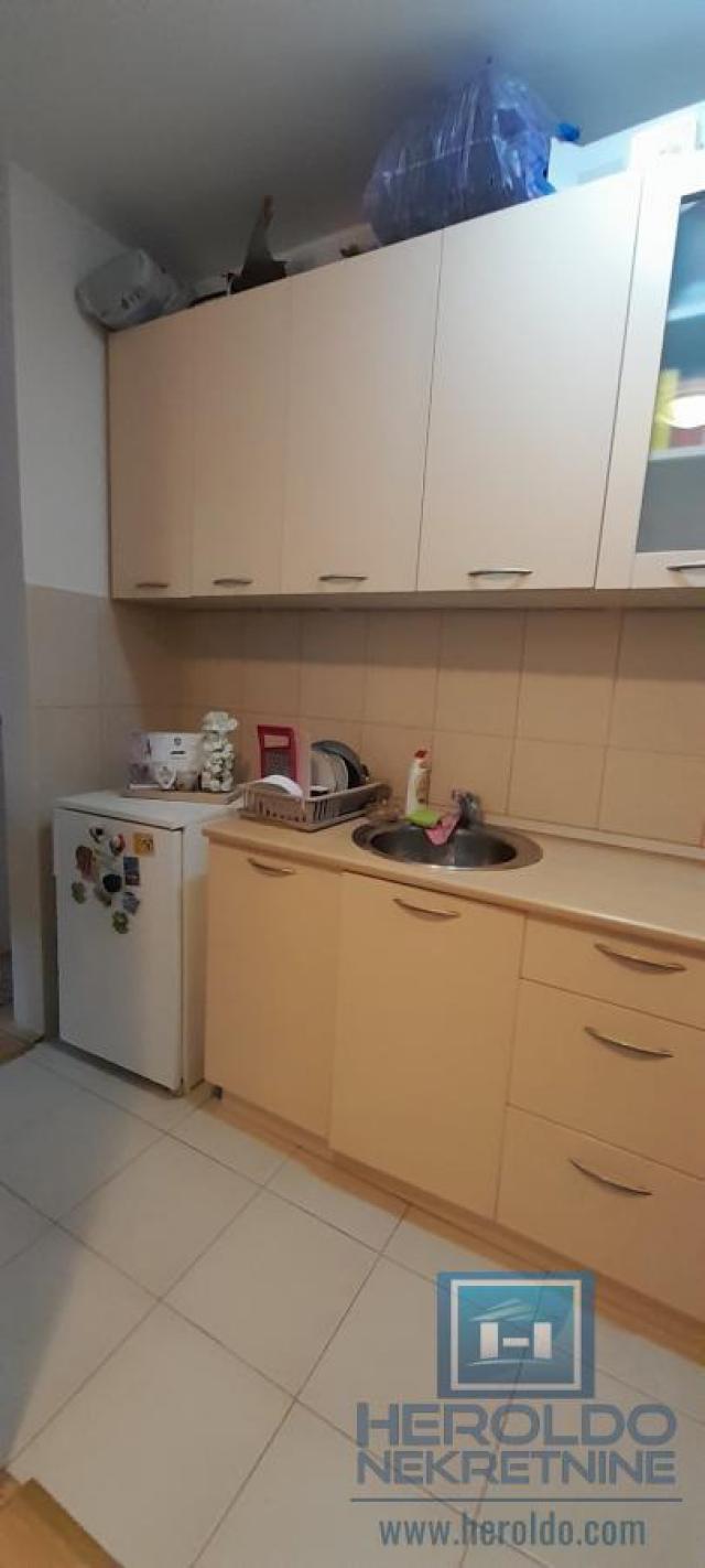 comfortable studio apartment with separate kitchen