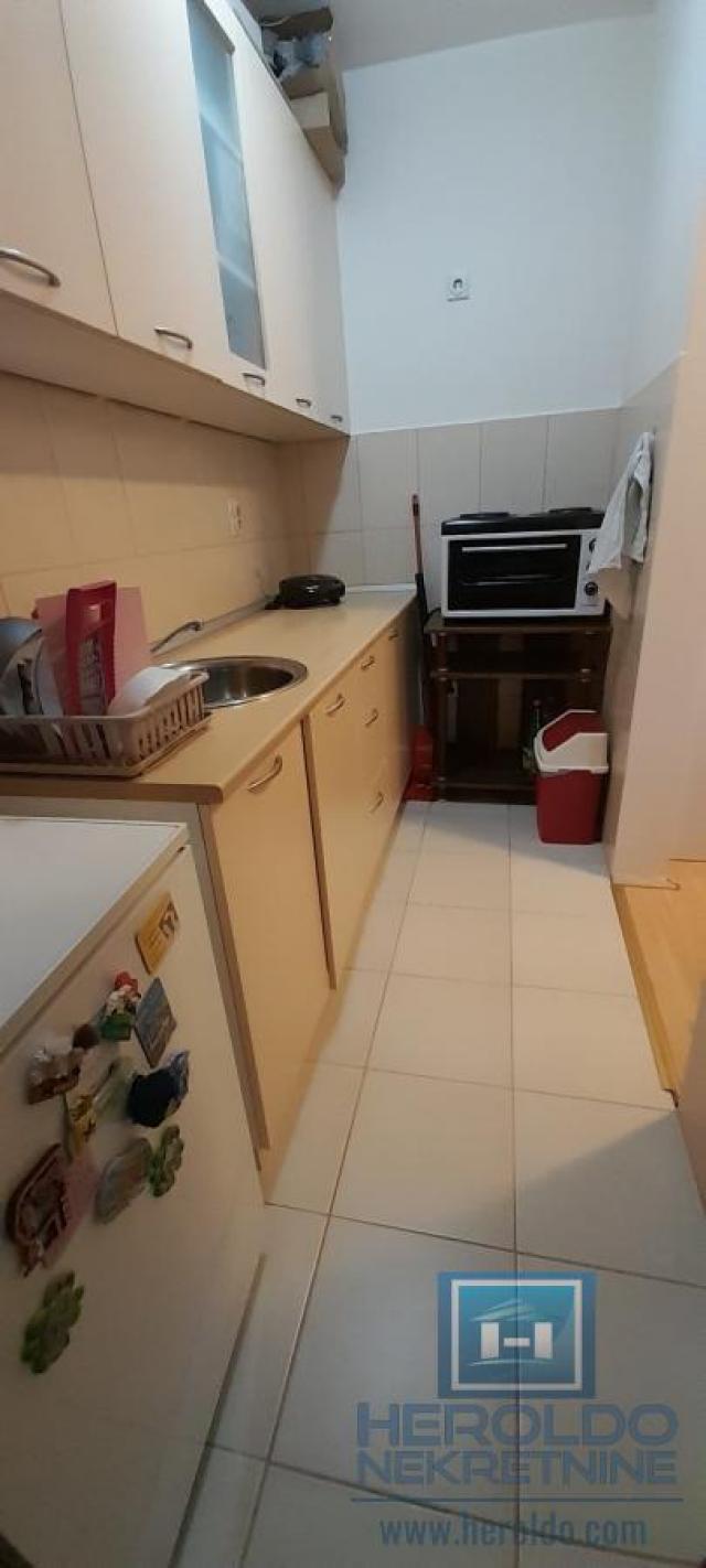 comfortable studio apartment with separate kitchen