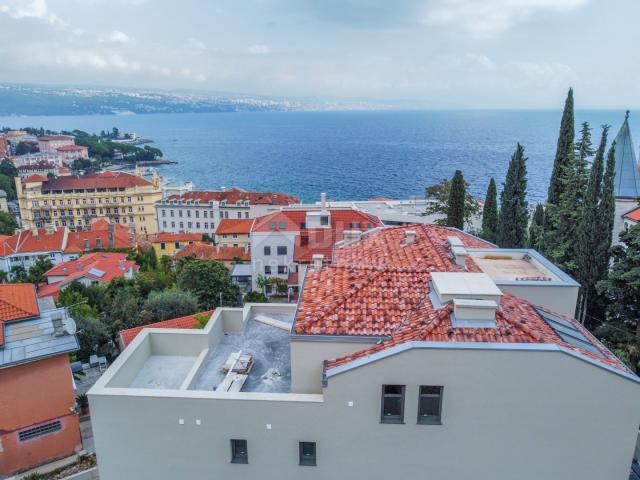 OPATIJA, CENTAR - stan s vrtom u novogradnji u centru Opatije s garažom, pogled na more