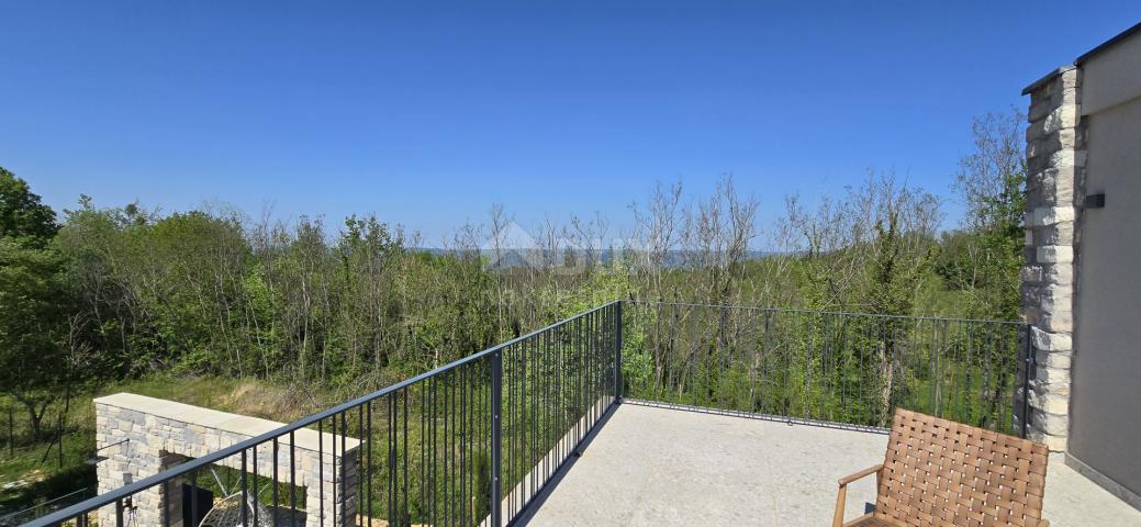 ISTRIA, MOTOVUN, SURROUNDINGS - Beautiful villa in front of a green zone with a panoramic view and c