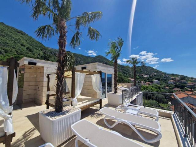 Luxurious two-bedroom apartment of 55m2 with swimming pool in Tivat