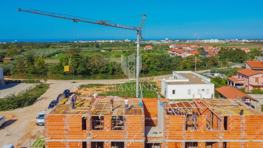 Umag, surroundings! Modern apartment under construction in a quiet location!