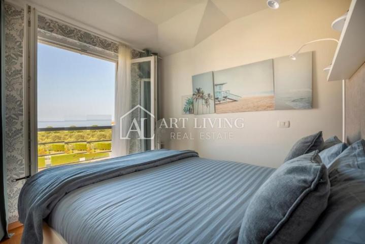 Istria, Umag, surroundings - a beautiful apartment with a swimming pool and an open sea view