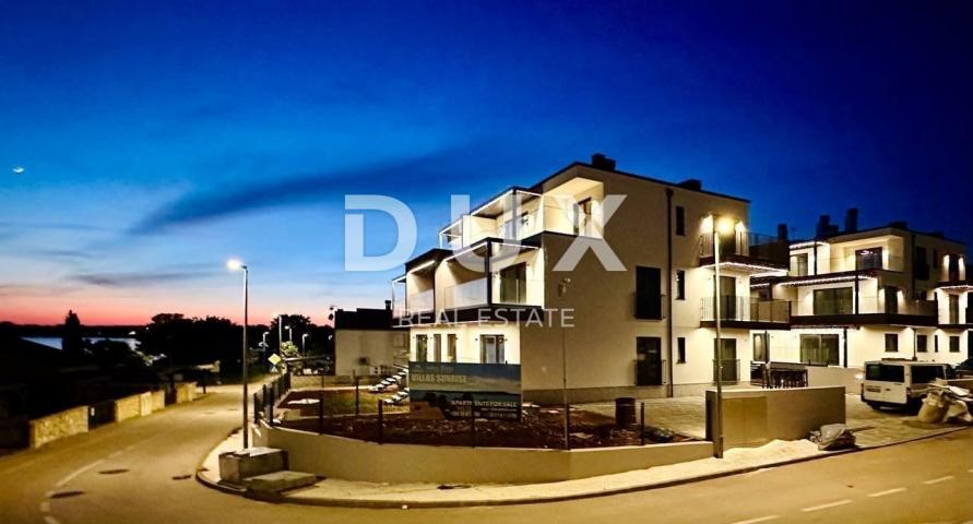 PULA, MEDULIN - larger apartment with a terrace overlooking the sea in a new building, 100m from the