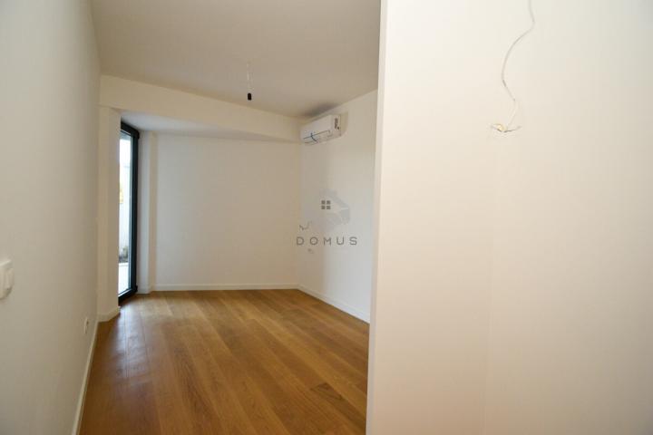 Jednosoban nov stan 56m2 + bašta 15m2, Bečići - Podgorica