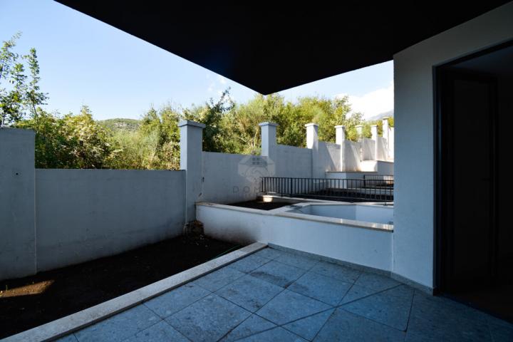 Jednosoban nov stan 56m2 + bašta 15m2, Bečići - Podgorica