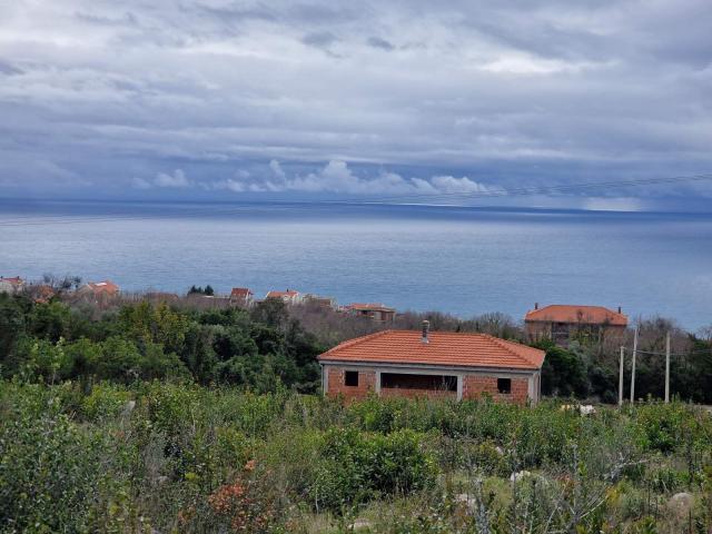 Urbanizovan plac  600m2 sa pogledom na more, Krimovica-Opstina Kotor. 