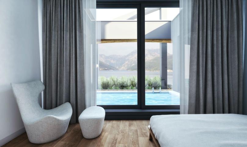 Ekskluzivno zemljište na obali 21.000m² – Krašići, Tivat | Projekat hotela spreman za realizaciju
