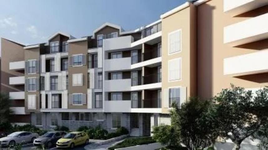 Dvosoban stan 53.10m² sa pogledom na more u novom stambeno poslovnoj zgradi-Budva, Adok