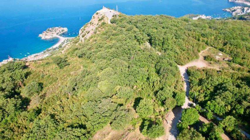 Urbanizovan plac 1250m2 sa panoramskim pogledom na more – Blizikuće, Budva