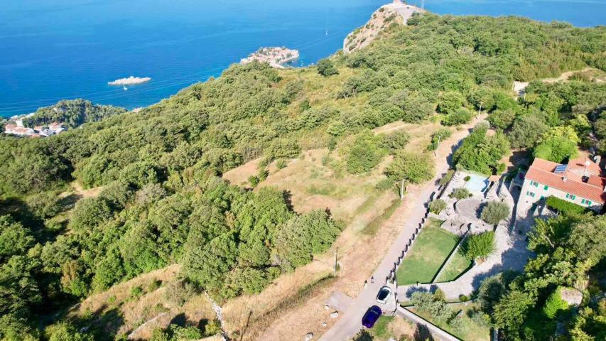 Urbanizovan plac 1250m2 sa panoramskim pogledom na more – Blizikuće, Budva