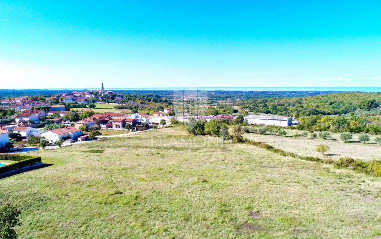 Poreč-Gebiet, Grundstück mit Projekt, Baugenehmigung und Meerblick!