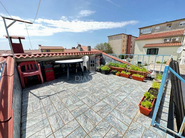 Pula, stan, kuća i dio vrta na dobroj lokaciji